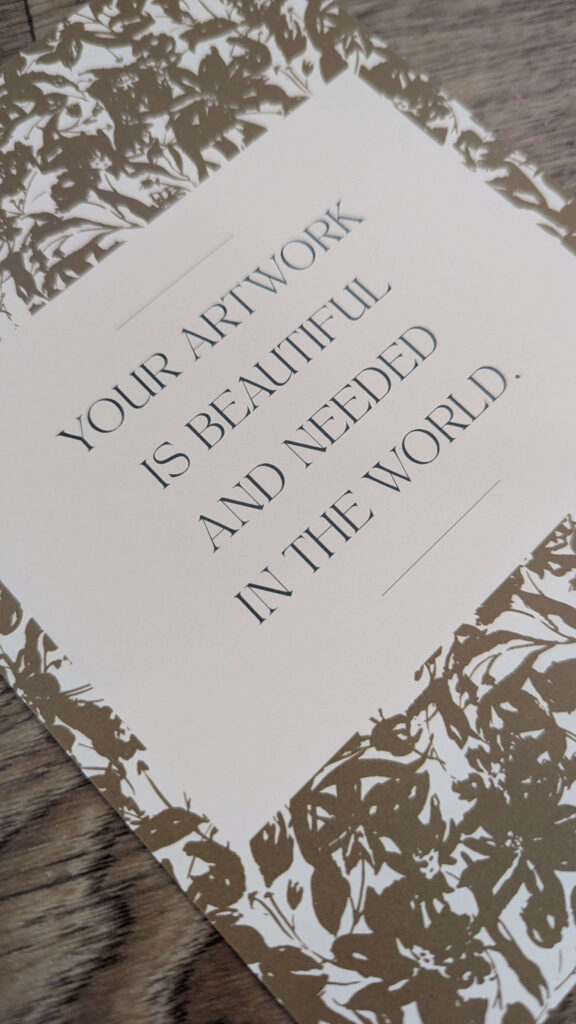 inspirational postcard from Bonnie Christine with floral border design and the words: 'Your artwork is beautiful and needed in the world.